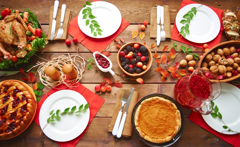 High angle view of table served for thanksgiving dinner with family